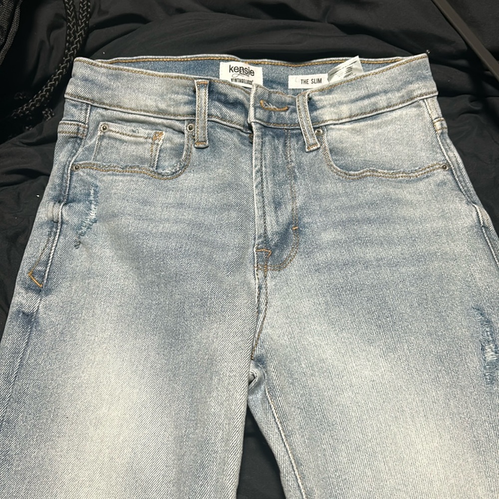 slim fit blue jeans